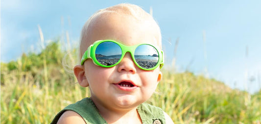 Boy with green Mokki Click & Change sunglasses