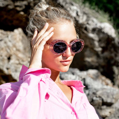 Woman wearing Mokki pink sunglasses