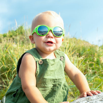 Little boy with green Mokki Click & Change sunglasses 0-2 years